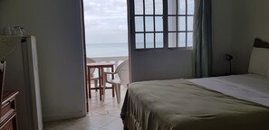 Standard Room, Ocean View | In-room safe, desk, iron/ironing board, free WiFi