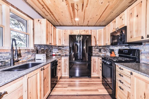 Remodeled lakeside cabin on Little Saint Germain with large deck, private dock,