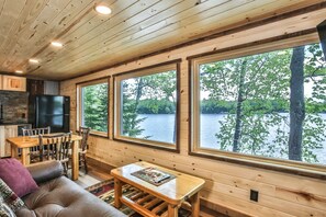 Smart TV, fireplace, DVD player - Remodeled lakeside resort cabin with fireplace, sandy beach, dock, firepit! (St. Germain)