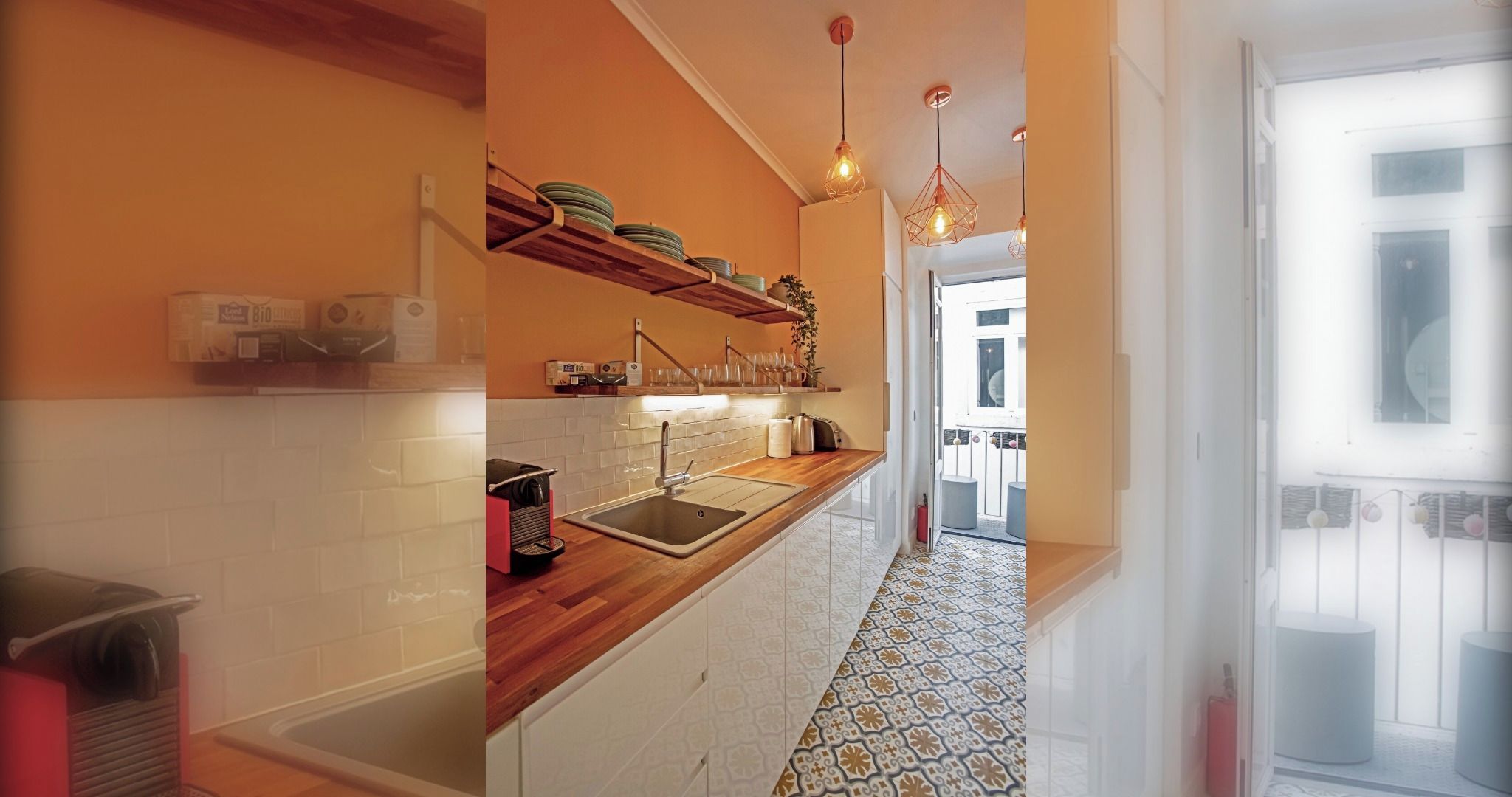 Una cocina moderna con encimera de madera, azulejos blancos y suelo estampado.