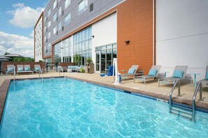 Seasonal outdoor pool, open 7:00 AM to 10:00 PM, pool umbrellas