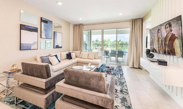 Televisión, consola de videojuegos, mesa de ping pong