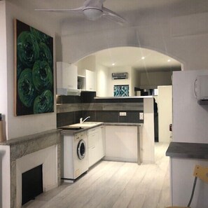 Microwave, coffee/tea maker, cookware/dishes/utensils