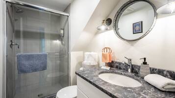 Hair dryer, towels, soap, shampoo