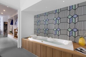 Shower, jetted tub, hair dryer, bidet