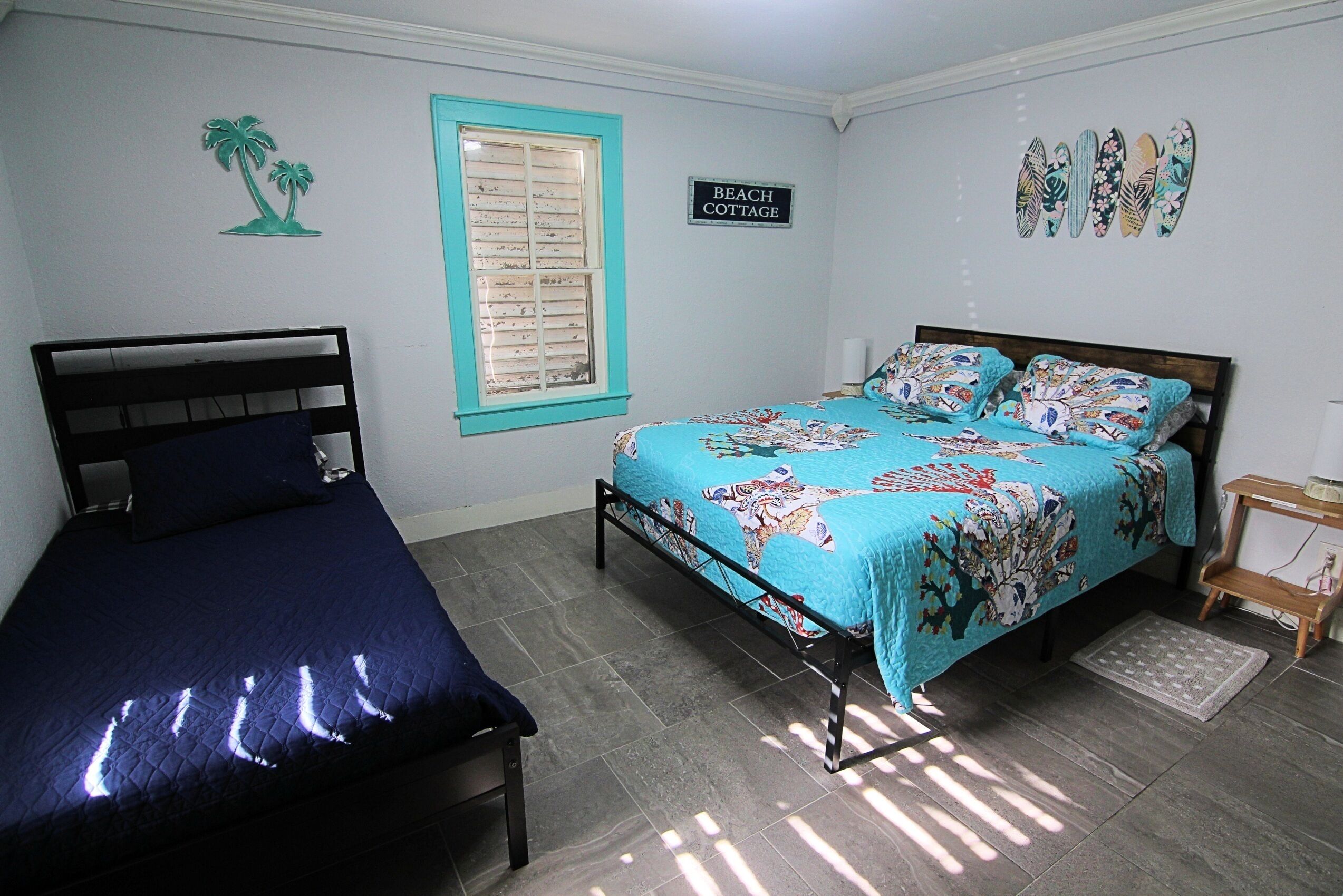 Cozy queen bedroom with coastal decor and relaxing atmosphere