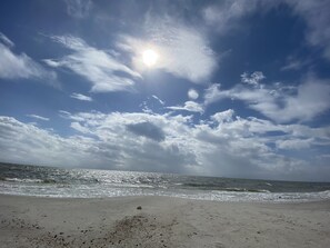 On the beach, sun-loungers, beach towels