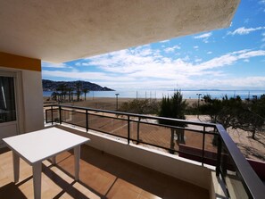 Enjoy breathtaking views of the beach and sea from this balcony.