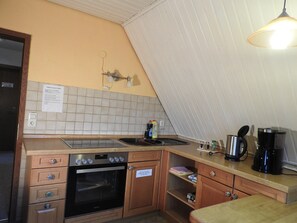 Fridge, oven, stovetop, coffee/tea maker