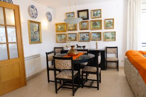 Dining - Charming Sitges Apartment with Shared Pool & City Views (Sitges)