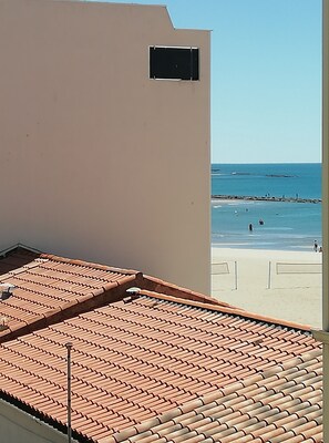 On the beach, beach towels