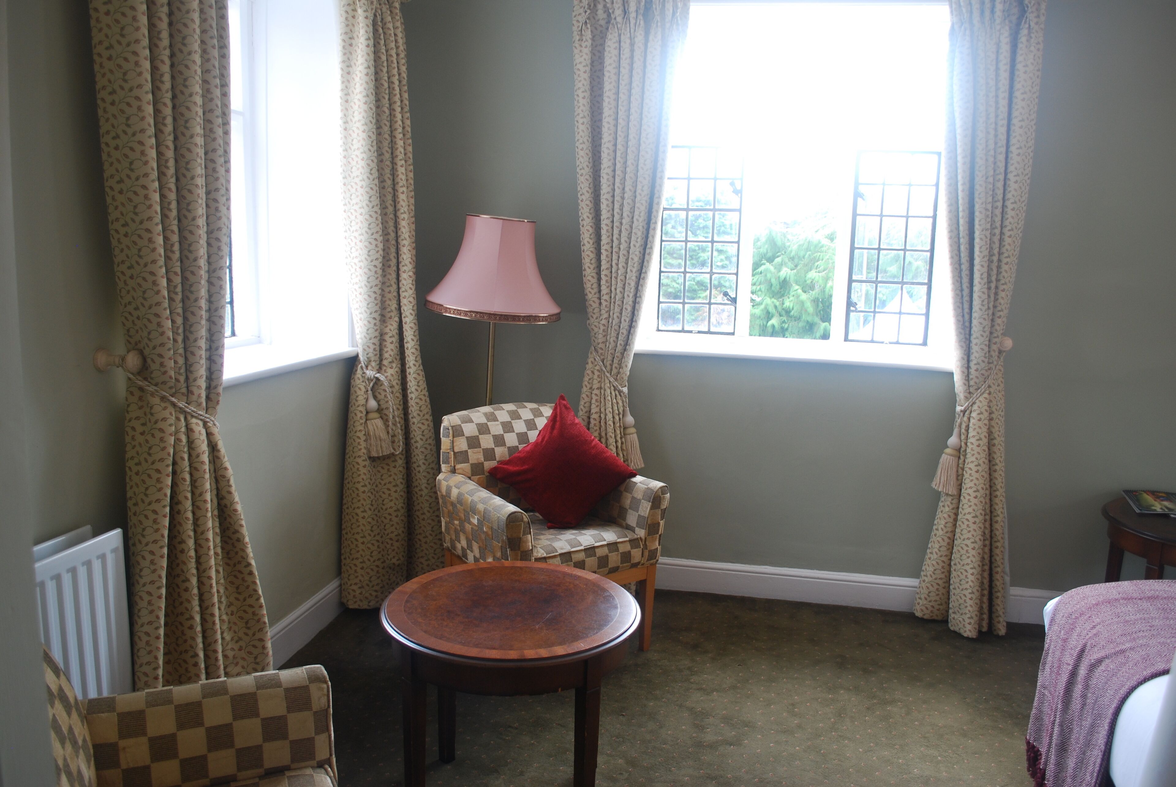 executive triple room | living area | 32-inch tv with digital channels