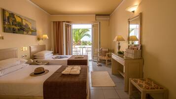 Standard Twin Room, Garden View | Living area | 32-inch flat-screen TV with satellite channels