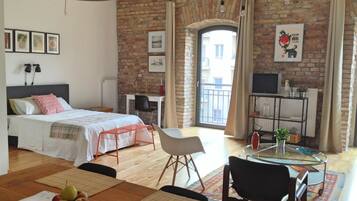 1 bedroom, desk, iron/ironing board, travel crib