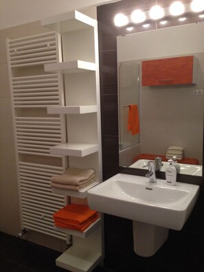 Hair dryer, towels, soap, shampoo