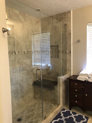 Combined shower/tub, hair dryer, towels, soap