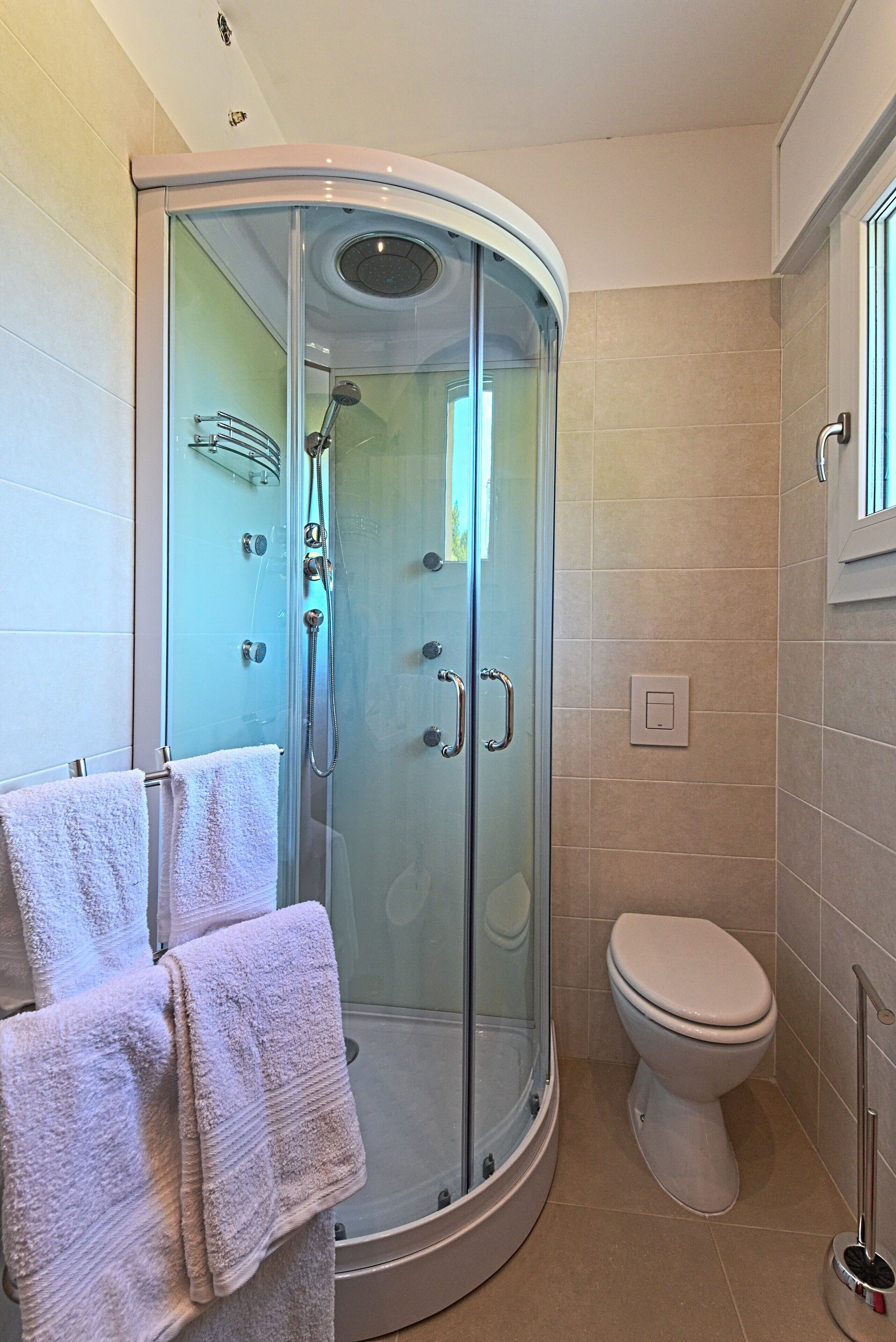Hair dryer, towels, soap, shampoo