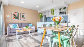 Premium Apartment (#2) | Living area | 50-inch Smart TV with satellite channels, TV