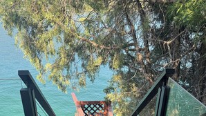 A wooden staircase leading to a viewing platform with a railing, overlooking a body of water. - PRIVATE ISLAND RETREAT On Gorgeous Flathead Lake Montana!!! (Somers)