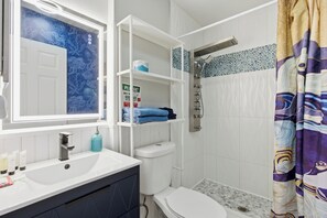 Shower, hair dryer, towels, soap