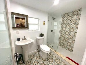 Shower, hair dryer, towels, soap