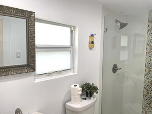Shower, hair dryer, towels, soap