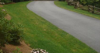 Escape to your cozy Cashiers retreat, just a hop away from Lake Glenville