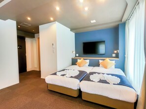 Family Room | Desk, laptop workspace, blackout drapes, soundproofing