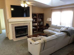 Smart TV, fireplace, DVD player, books