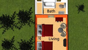 Planta baixa 2D de uma casa com sala de estar, quarto e banheiro.
