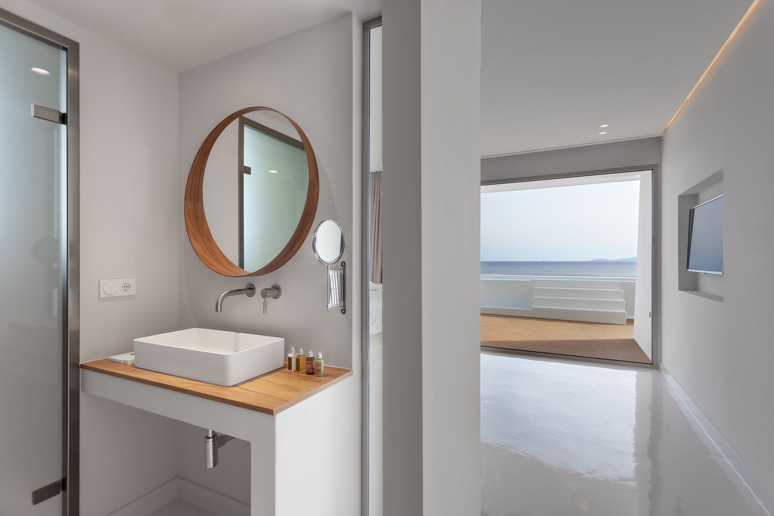 signature suite, private pool, sea view (infinity) | bathroom | shower, rainfall showerhead, designer toiletries, hair dryer