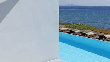 Premium Double Room, Sea View (Direct Pool Access) | Minibar, in-room safe, blackout curtains, iron/ironing board