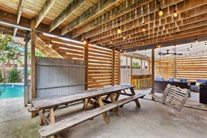 Outdoor dining - Sand Castle ~ 3-Story Beach Retreat with Heated Pool, Tiki Bar & Dual Game Rooms (Panama City Beach)