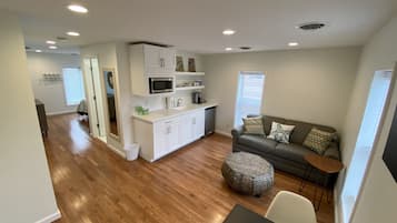 Exclusive Double Room Single Use | Living area | 42-inch TV with digital channels