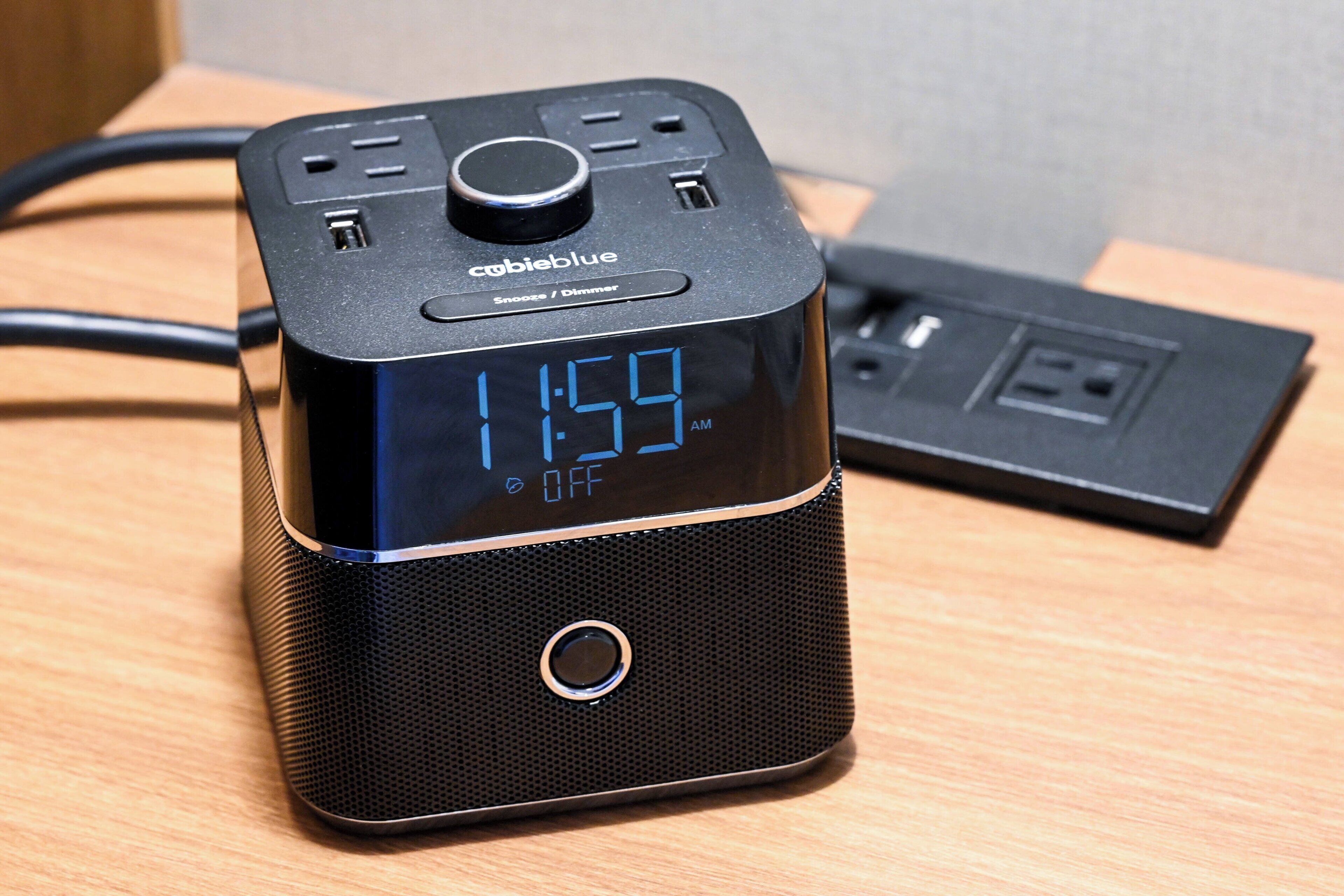 desk, laptop workspace, iron/ironing board, bed sheets