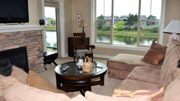 Apartment, Multiple Beds (Apartment with Balcony) | Living room | Fireplace