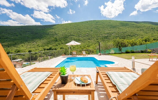 Outdoor pool, pool loungers