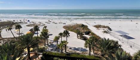 On the beach, sun-loungers, beach towels