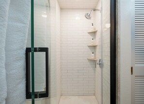 Combined shower/tub, hair dryer, towels, soap