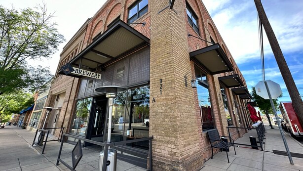 A brick building with a sign reading "BREWERY" and the address "921 A". - Park Hotel (Clarkdale)