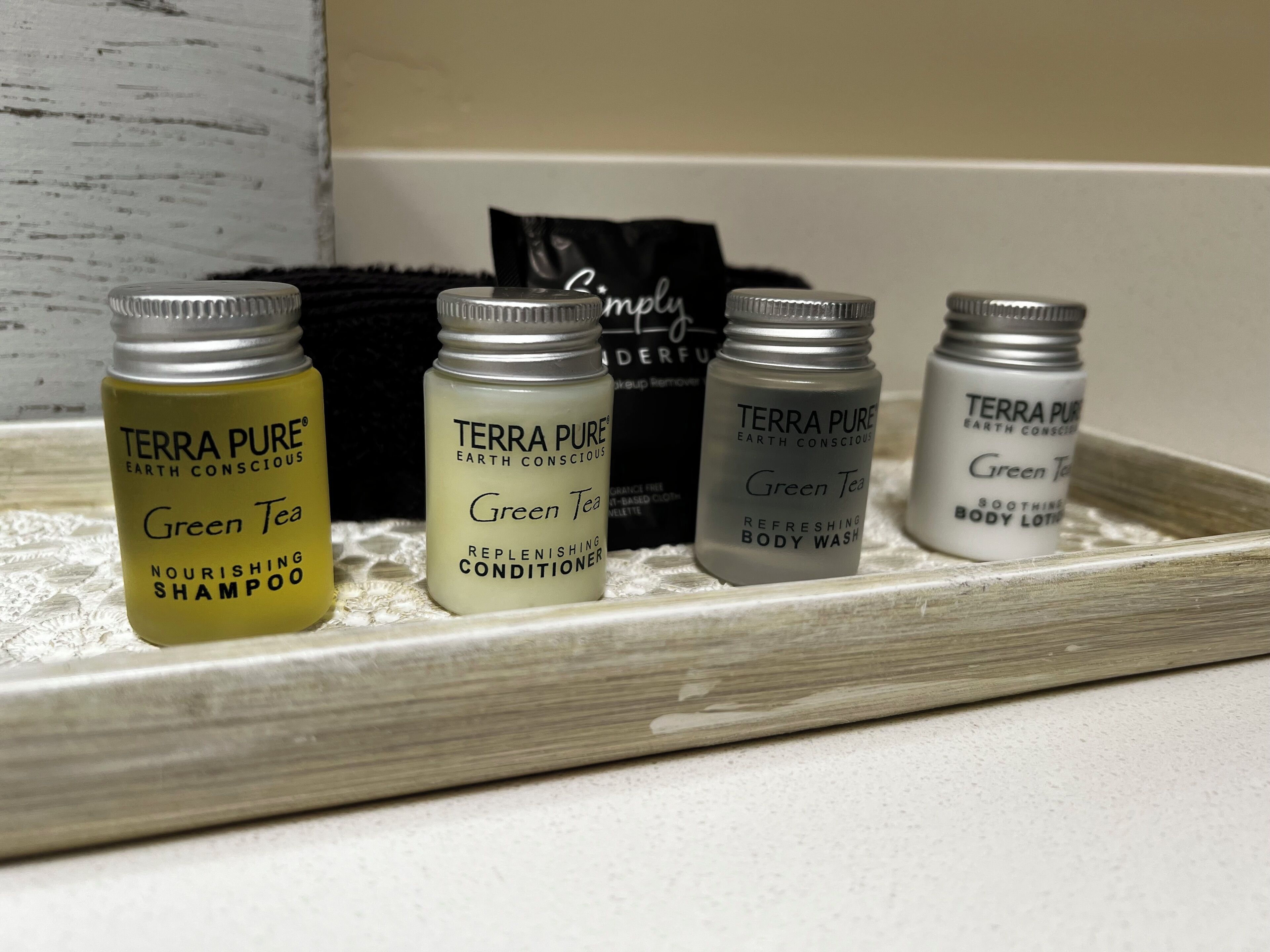 shower, designer toiletries, hair dryer, towels