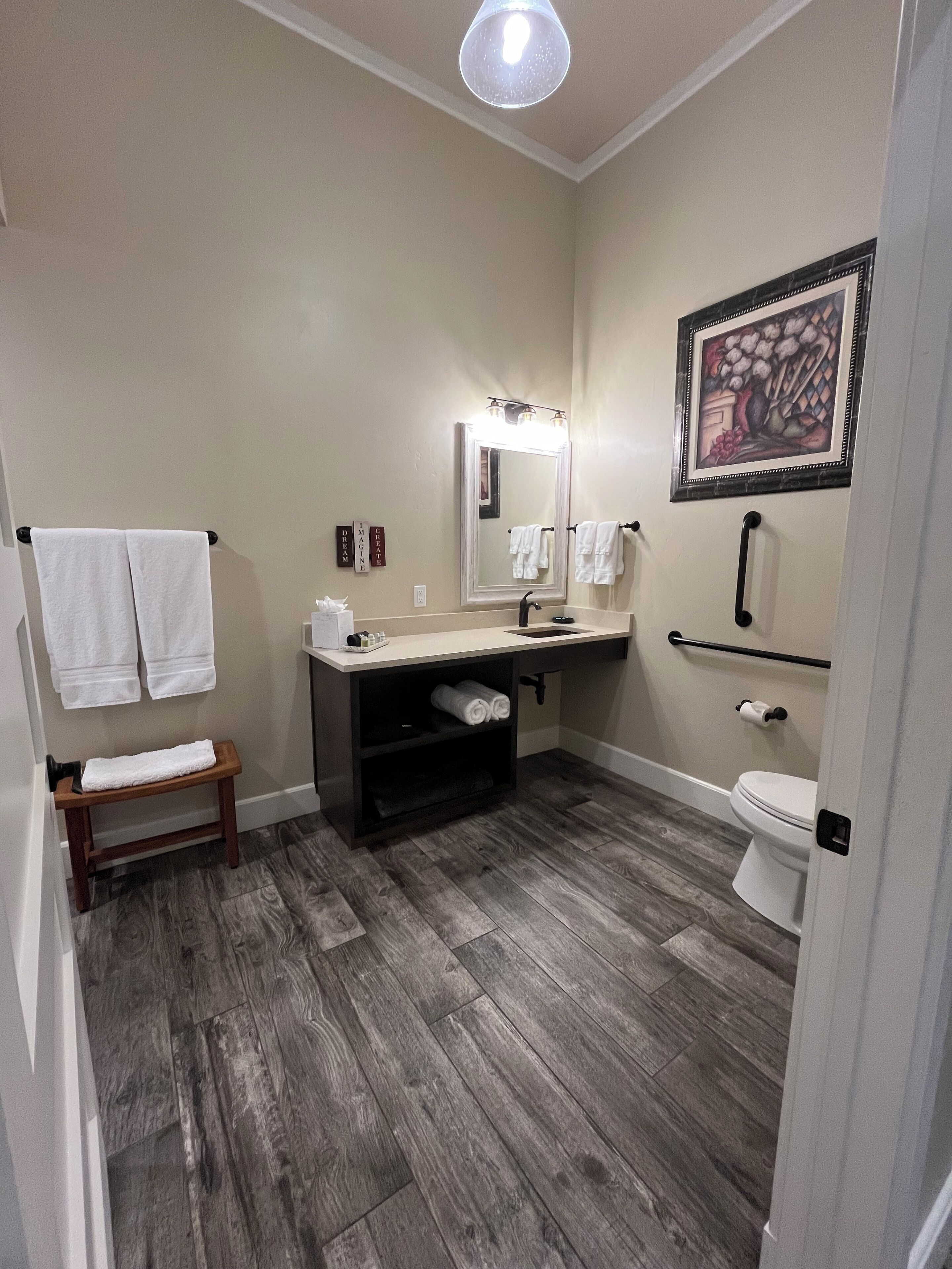 deluxe room | bathroom | shower, designer toiletries, hair dryer, towels