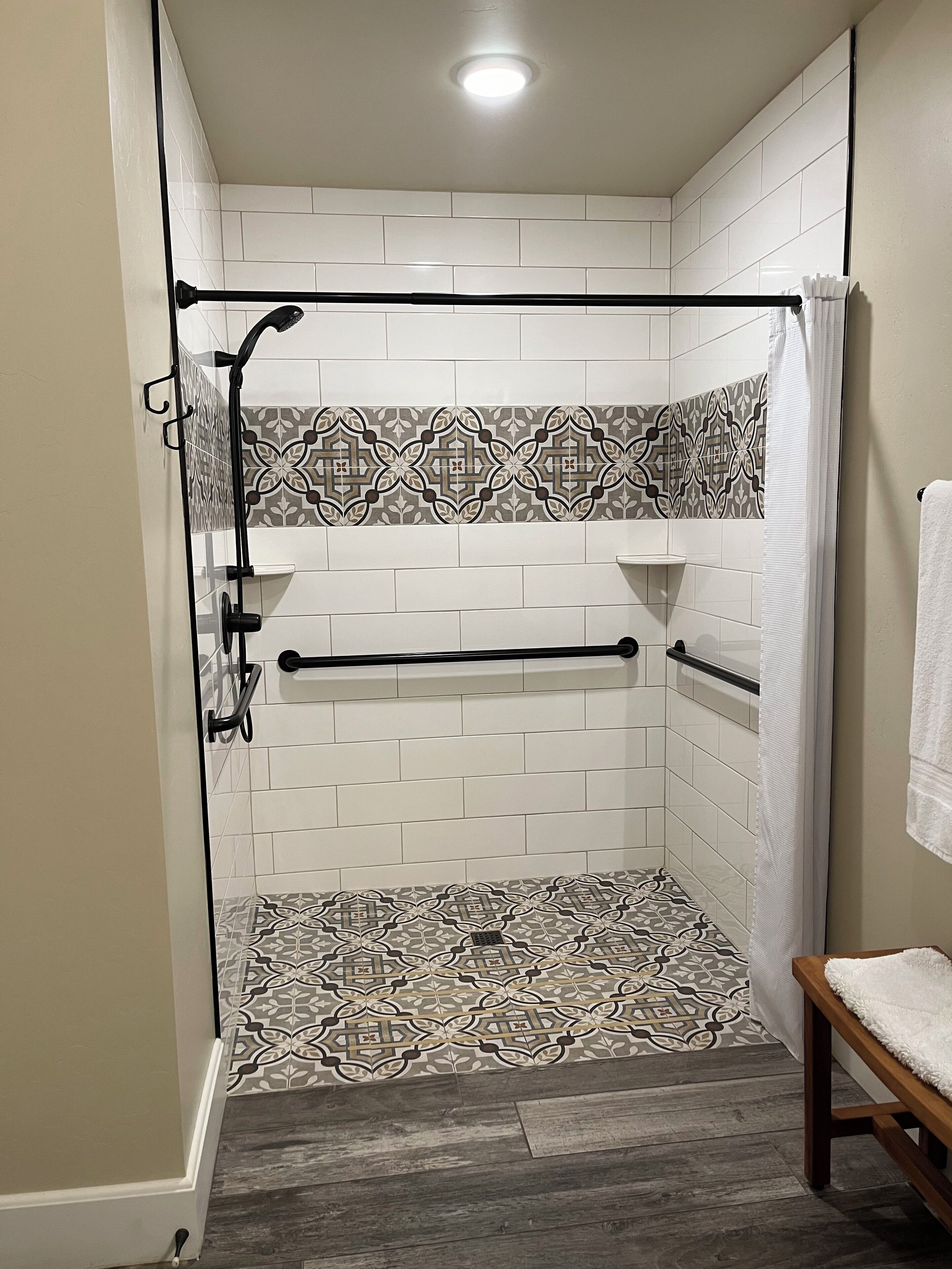 deluxe room | bathroom | shower, designer toiletries, hair dryer, towels