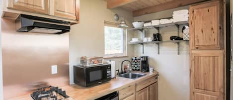 Fridge, microwave, stovetop, coffee/tea maker