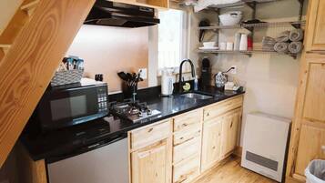 Microwave, stovetop, coffee/tea maker, toaster