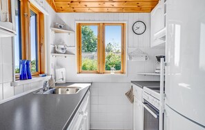 ثلاجة، موقد طهي مسطح، غسالة أطب اق، ماكينة لصنع القهوة/الشاي