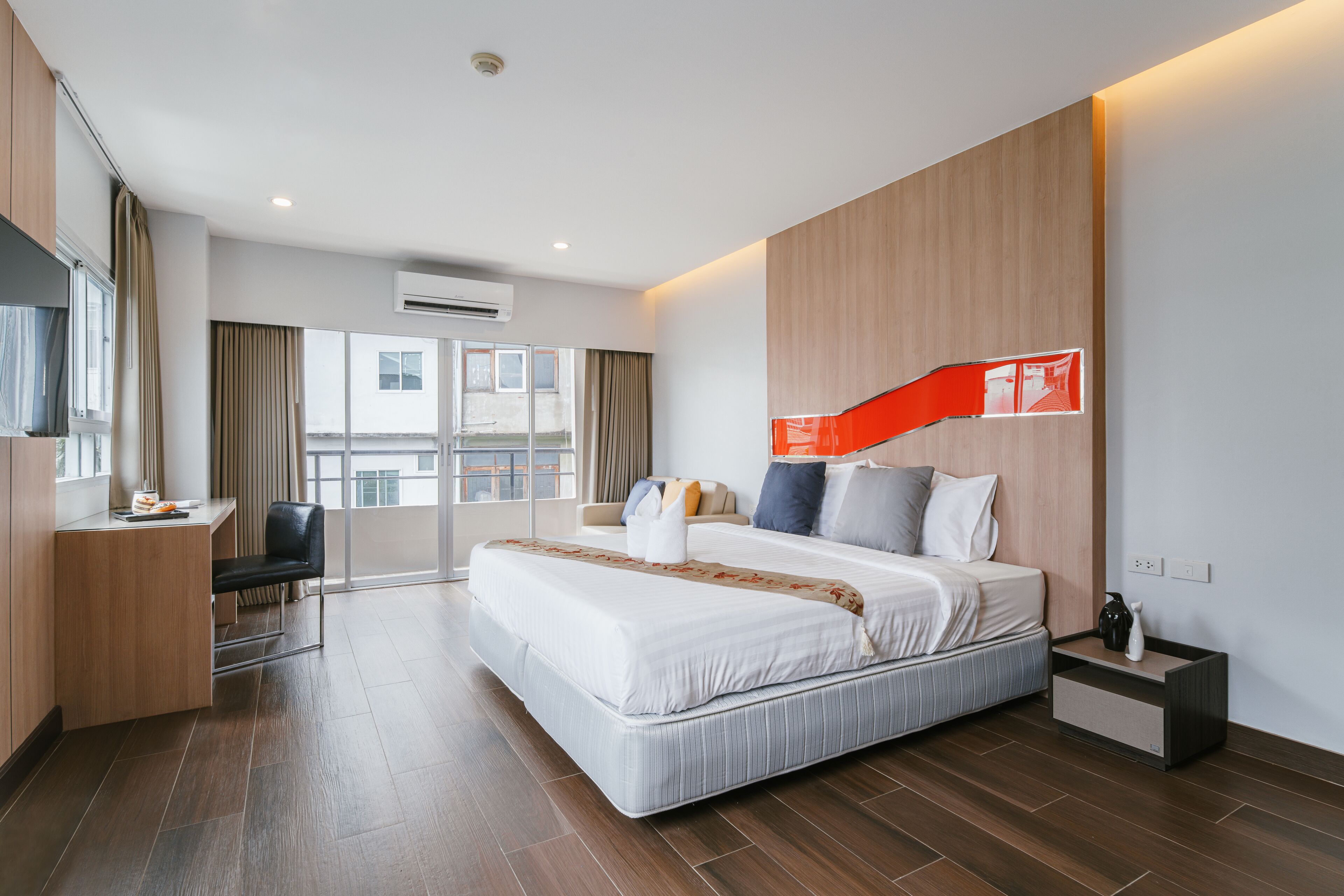 Habitación ejecutiva | Ropa de cama hipoalergénica y caja de seguridad en la habitación 