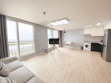 Premier Condo | Living area | 1-inch flat-screen TV with cable channels, TV