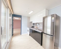 Family Condo | Private kitchen | Fridge, microwave, electric kettle, rice cooker