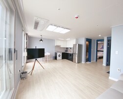 Premier Condo | Living area | 1-inch flat-screen TV with cable channels, TV